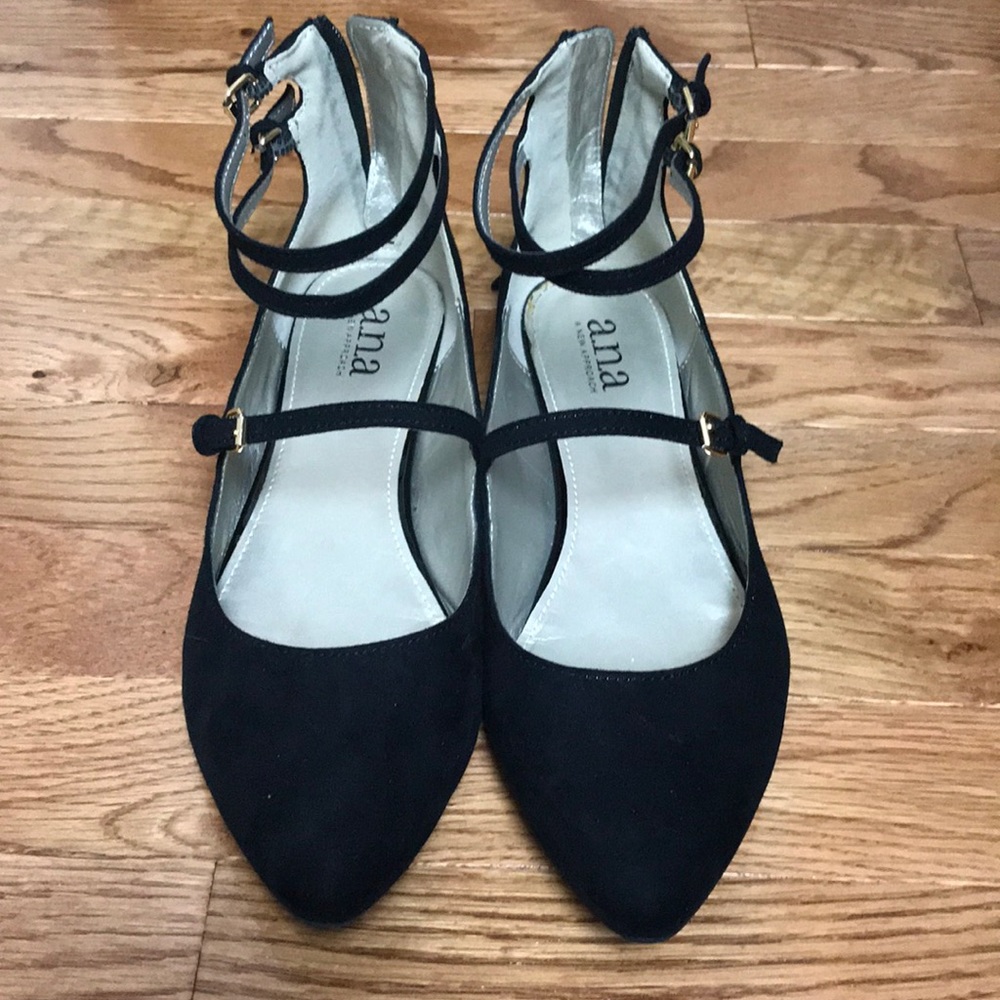 Women’s black dress shoes.